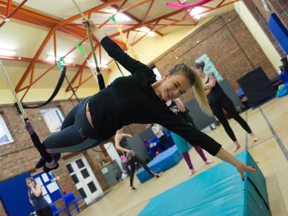 Reporter Millie Salkeld tries her hand at aerial circus skills with Top Banana Circus 
Picture: Duncan Shepherd (180340)