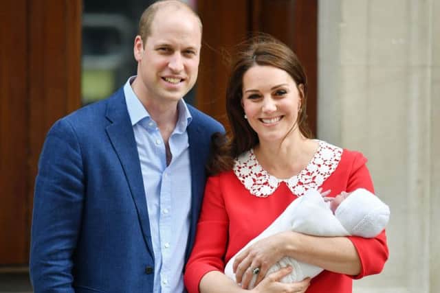 Don't rain on their parade! The Duke and Duchess of Cambridge and their newborn son 
Picture: Dominic Lipinski/PA Wire