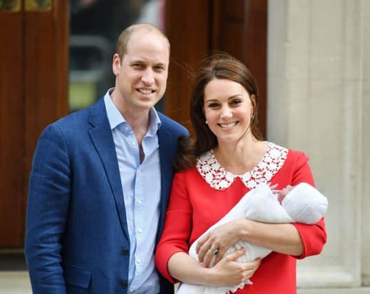 Don't rain on their parade! The Duke and Duchess of Cambridge and their newborn son 
Picture: Dominic Lipinski/PA Wire
