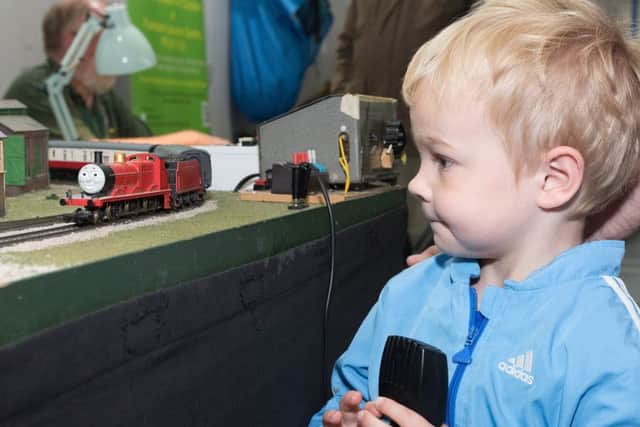 Tristan Davies, 4 gets to play with one of Thomas the Tank engine's friends
Picture by Keith Woodland