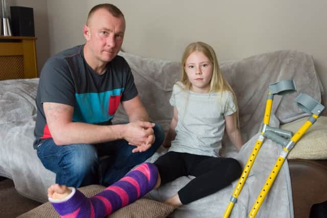Darren Shuker and his daughter Emily, 10
Picture: Duncan Shepherd (180346-004)
