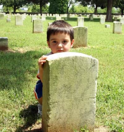 A meander through a graveyard was all part of Kieran and Louie's fun day in Romsey