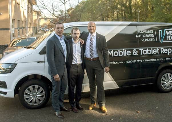 WeFix founder Oliver Murphy (centre) with Onecom owners Darren Ridge (left) and  Aaron Brown