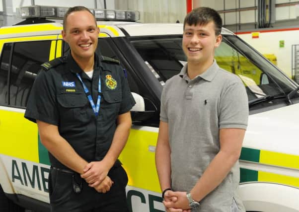 Rapid Response Paramedic Fergus Carter-Brazier, left, with Dan Browning

Picture by Malcolm Wells (180430-6376)