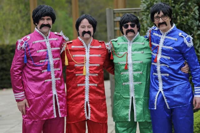 30/04/2018Friends and family members, some dressed in musically themed fancy dress, attend the funeral of Hayling Island musician Mick Thompson at Havant Crematorium.Picture Ian Hargreaves  (180457-1) PPP-180430-180607006