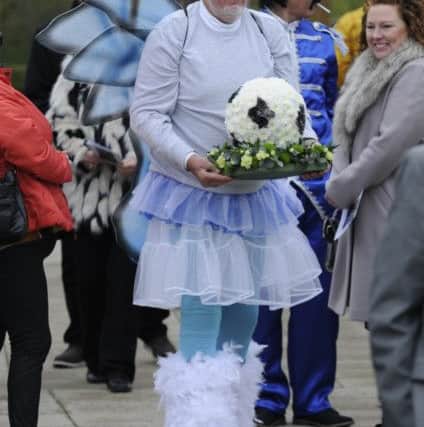 A mourner at Mick Thompson's funeral.
Pictures by Ian Hargreaves