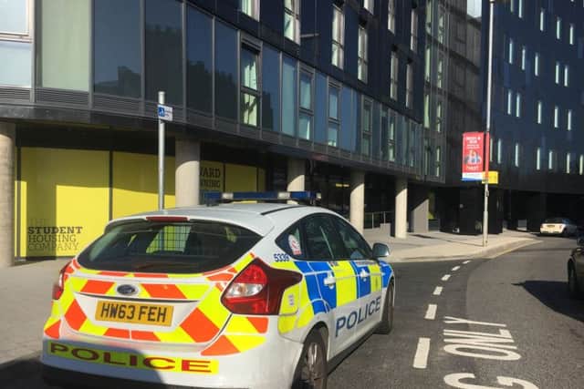 Police at Catherine House in Stanhope Road Portsmouth on April 20 the morning after a suspicious device was found in the building. Picture: Ben Fishwick PPP-180420-154121001