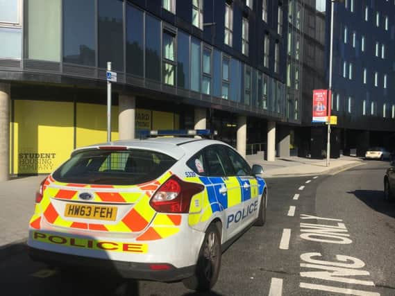 Police at Catherine House in Stanhope Road Portsmouth on April 20 the morning after a suspicious device was found in the building. Picture: Ben Fishwick PPP-180420-154121001