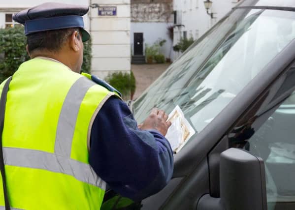 A parking enforcement offiver at work