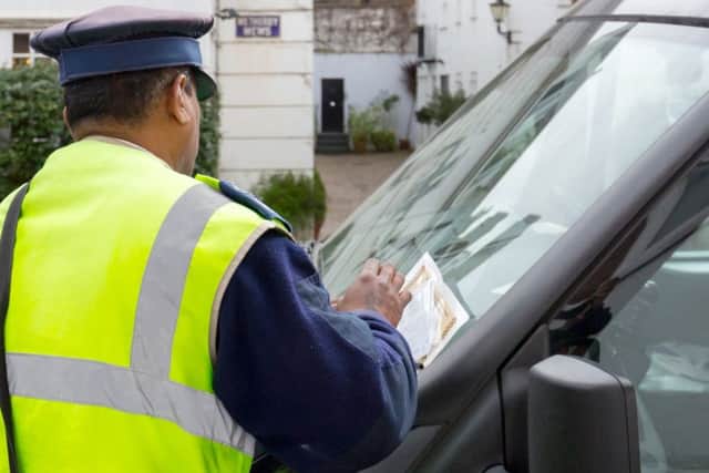 A parking enforcement offiver at work