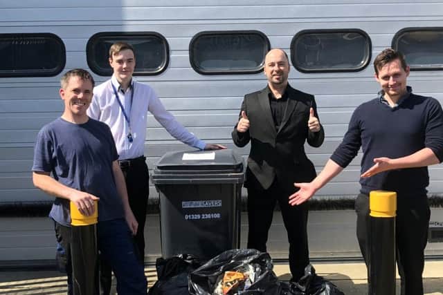 Employees at Green Co cleaning up their site on Earth Day