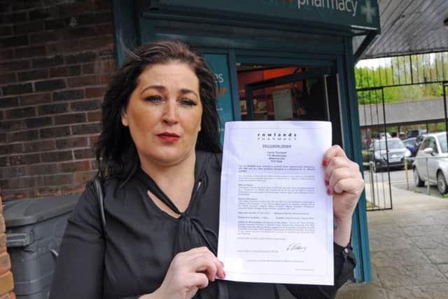 Carrie Theobald outside Rowlands Pharmacy Picture: Malcolm Wells