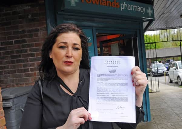 Carrie Theobald outside Rowlands Pharmacy Picture: Malcolm Wells