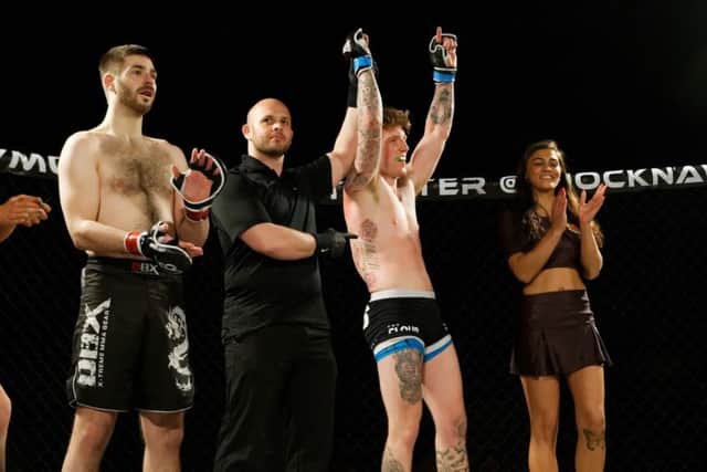 Kye Stevens celebrates his win at Shock N Awe 27. Picture: Neil Marshall