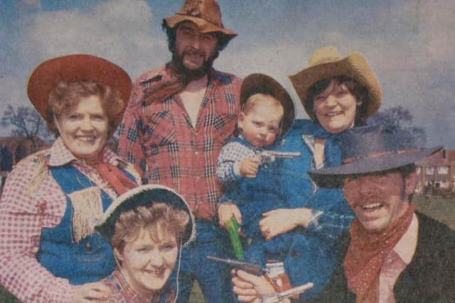 Pistol-packing cowboys and cowgirls with Scott Bacon. From left, Sally Lawton, Sandy Harris, Rory Stevenson, Rosemarie Bacon and Alan Small before the kick off