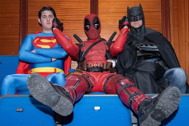Clash of the titans - Deadpool messes around with Superman and Batman     Pictures: Vernon Nash (180382 -017)