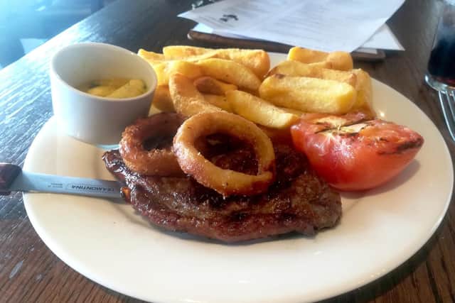 Main course -   28 day aged 10oz Blackgate sirloin steak with chips and onion rings