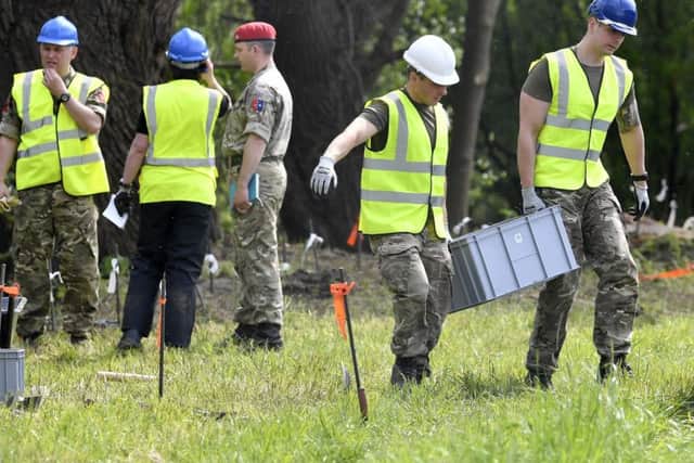Royal Military Police by the river Alme in Paderborn, Germany Picture: AP Photo/Martin Meissne