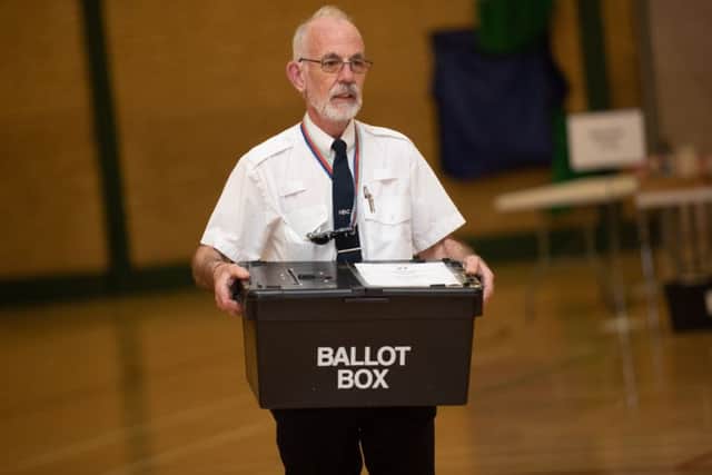 A ballot box being delivered to the counters at Havant Leisure CentrePicture: Vernon Nash (180503 - ELECTION HAVANT - 008) PPP-180305-231142006