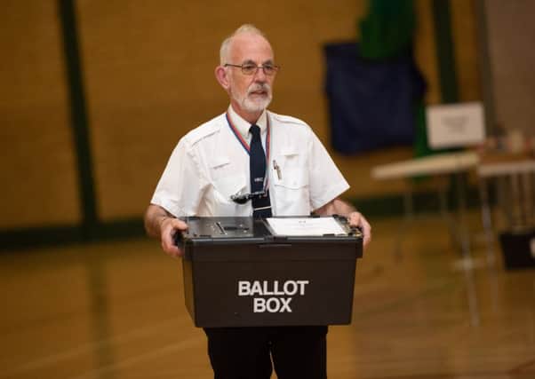 A ballot box being delivered to the counters at Havant Leisure Centre
Picture: Vernon Nash (180503 - ELECTION HAVANT - 008) PPP-180305-231142006