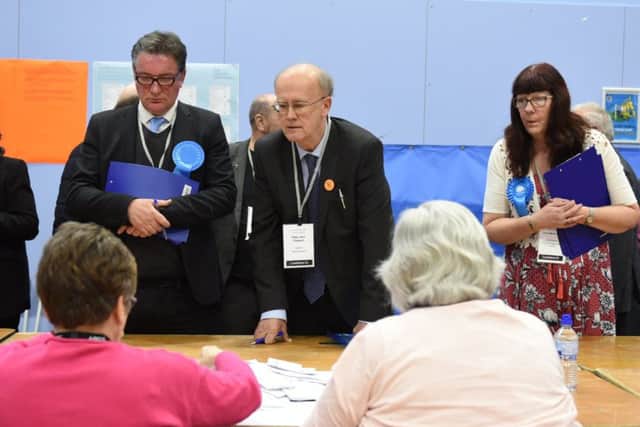 Catch Line: 180503- Election Gosport
Date: 3-5-2018
Location: Gosport Leisure Centre, Foresrt Way, Gosport
Story: Local election count for Gosport wards - Candidates observe the count - (centre) Peter Chegwyn, Liberal Democrate leader
Picture: Duncan Shepherd PPP-180305-225639006