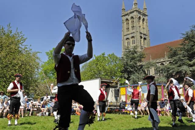 Morris men dance in the sunshine at the St Mary's Church Fair in Portsmouth Picture Ian Hargreaves (180471-1)