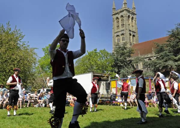 Morris men dance in the sunshine at the  St Mary's Church Fair in Portsmouth     Picture Ian Hargreaves  (180471-1)