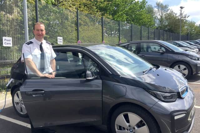Insp Andy Tester with the new electric BMW i3 car fleet for Hampshire police. Picture: Hampshire police
From: