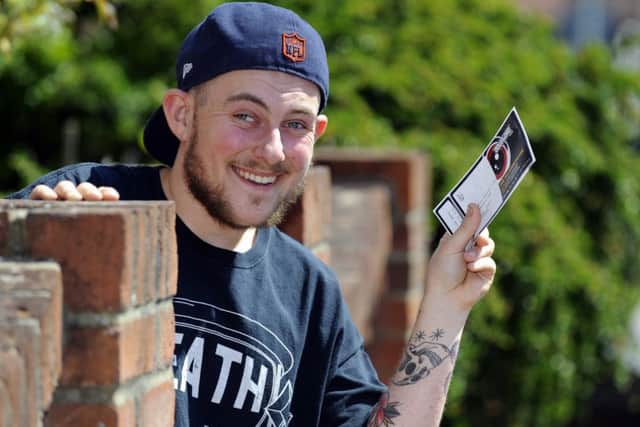 Billy Cornish with the Download Festival tickets he has donated to Whitney Hacket   Picture:  Malcolm Wells (180506-3470)