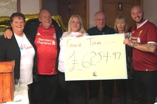 Becky Hughes ans Jeremy Cameron with supporters at the charity night