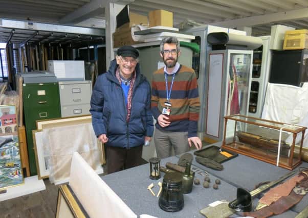 Arthur Mack, left, who found the site of HMS Invincible, with Christopher Gale, senior curator of The National Museum of the Royal Navy