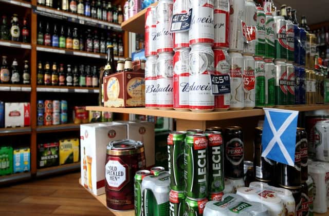 Alcohol for sale in an Edinburgh off-licence as Scotland became the first country in the world to introduce minimum unit pricing for drinks.