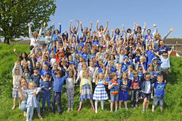 Cheers for Blue day from children at Moorings Way Infant School in Southsea Picture: Malcolm Wells (180504-6953)