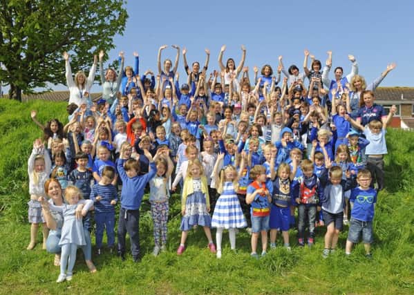Cheers for Blue day from children at Moorings Way Infant School in Southsea    Picture: Malcolm Wells (180504-6953)