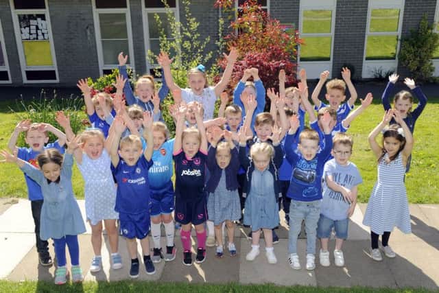 Children celebrate Blue Day at Purbrook Infant School      Picture: (180504-6934)
