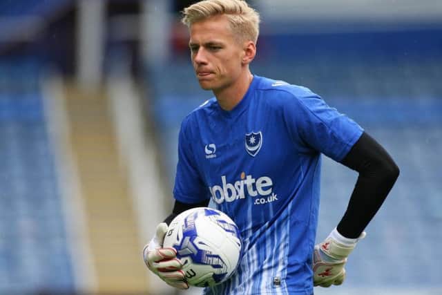 Alex Bass is handed his Football League debut.