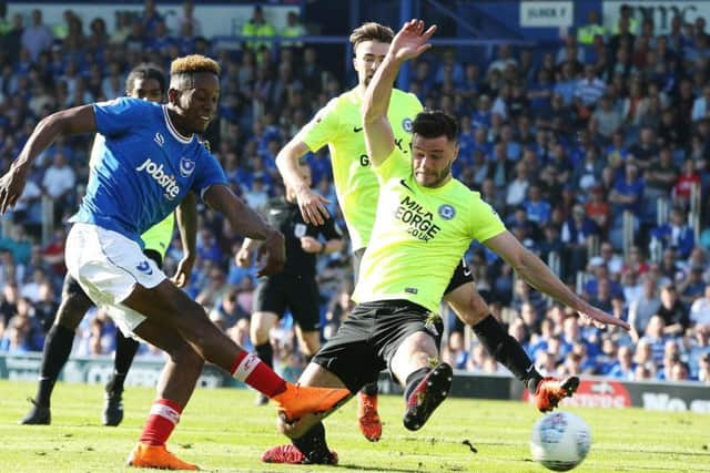 Jamal Lowe set up Brett Pitman for Pompey second goal against Peterborough