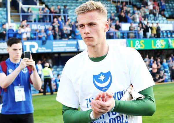 Pompey youngster Alex Bass made his league debut against Peterborough on Saturday