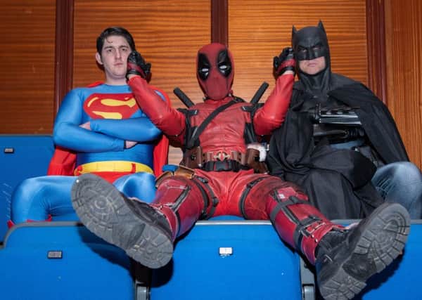 Deadpool messes around with Superman and Batman. 
Picture: Vernon Nash (180382 -017) PPP-180605-073819006