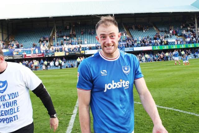 Matt Clarke on a lap of appreciation around Fratton Park following Saturday's win against Peterborough