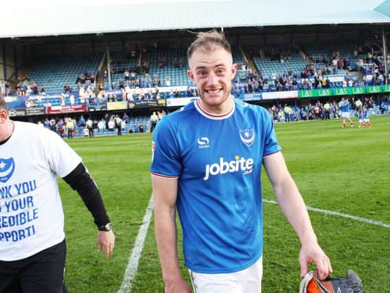 Matt Clarke on a lap of appreciation around Fratton Park following Saturday's win against Peterborough
