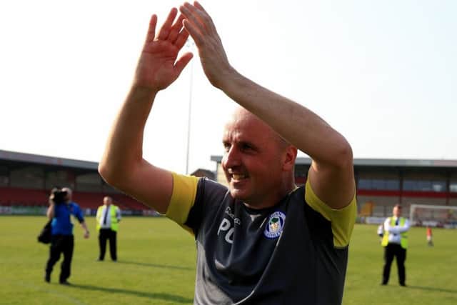Paul Cook celebrates Pompey's League On title success