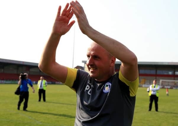 Paul Cook celebrates Pompey's League On title success
