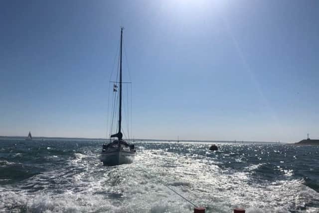 Gafirs tow a yacht with a suspected fire on Sunday. Picture: Gafirs.