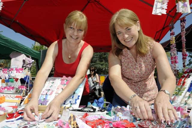 Stall holders Jackie Carhill and Tracey Norris at the St Mary's Church May fair   
Picture: Ian Hargreaves  (180471-1)
