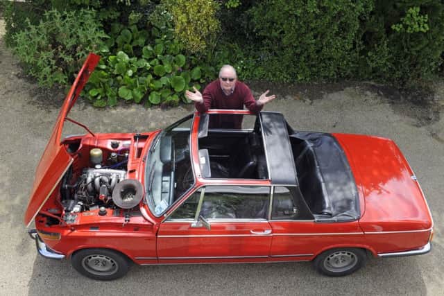 Peter Forrest with his beloved BMW 2002 Cabriolet after it had an engine rebuild      Picture: Malcolm Wells (180504-7048)