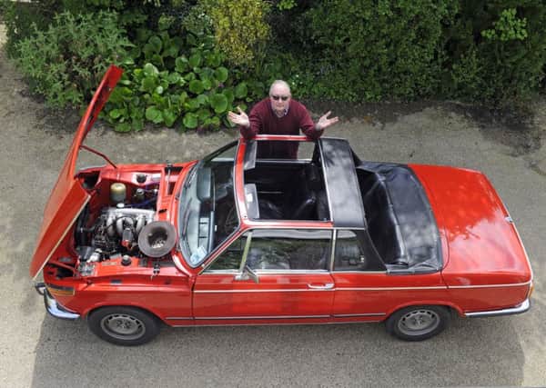 Peter Forrest with his beloved BMW 2002 Cabriolet after it had an engine rebuild
Picture: Malcolm Wells (180504-7048)
