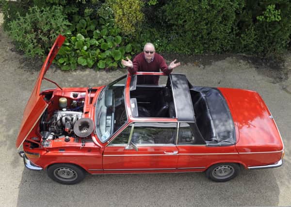 Peter Forrest with his beloved BMW 2002 Cabriolet after it had an engine rebuild      

Picture: Malcolm Wells (180504-7048)