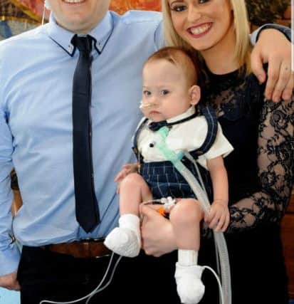 Hannah Bloomfield and Wayne Olivares with son Max Olivares at his christening on March 23, at Southampton General Hospital. Picture: Mark Robbins Photography