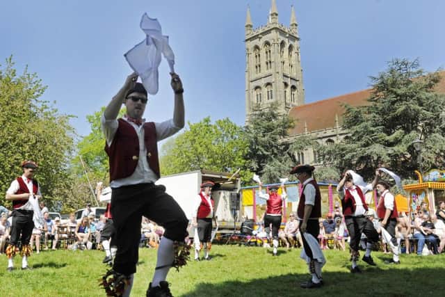 Bright sunshine greets fayre goers at the St Mary's Church Fayre in Portsmouth. Morris Men. Picture Ian Hargreaves  (180471-09)